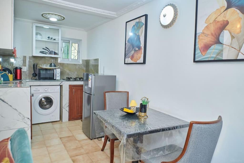 Ninja House Studio Chic Le Turquois Dore ياوندي المظهر الخارجي الصورة