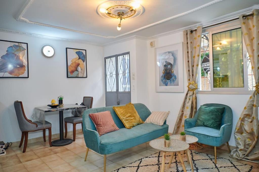 Ninja House Studio Chic Le Turquois Dore ياوندي المظهر الخارجي الصورة